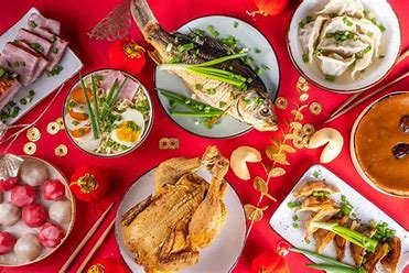 Traditional foods during Chinese New Year carry deep symbolic meaning, representing prosperity, good fortune, and unity, with dishes like dumplings, rice cakes, and fish celebrating wealth and family harmony.